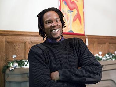 gathering-jenkins_lg.jpg Restaurant owner with arms crossed and smiling