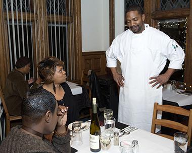gathering-moore_lg.jpg Chef talking with satisfied customers