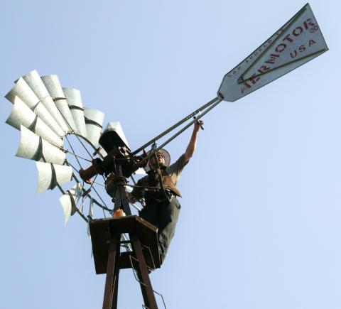 melvin-troyer-works-on-windmill.jpg Melvin Troyer of Sugarcreek, Ohio, works on one of the windmills on Kresge's headquarters campus.