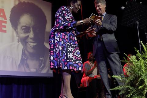 Monograph presented to Eminent Artist Gloria House Rip Rapson presents monograph to Gloria House