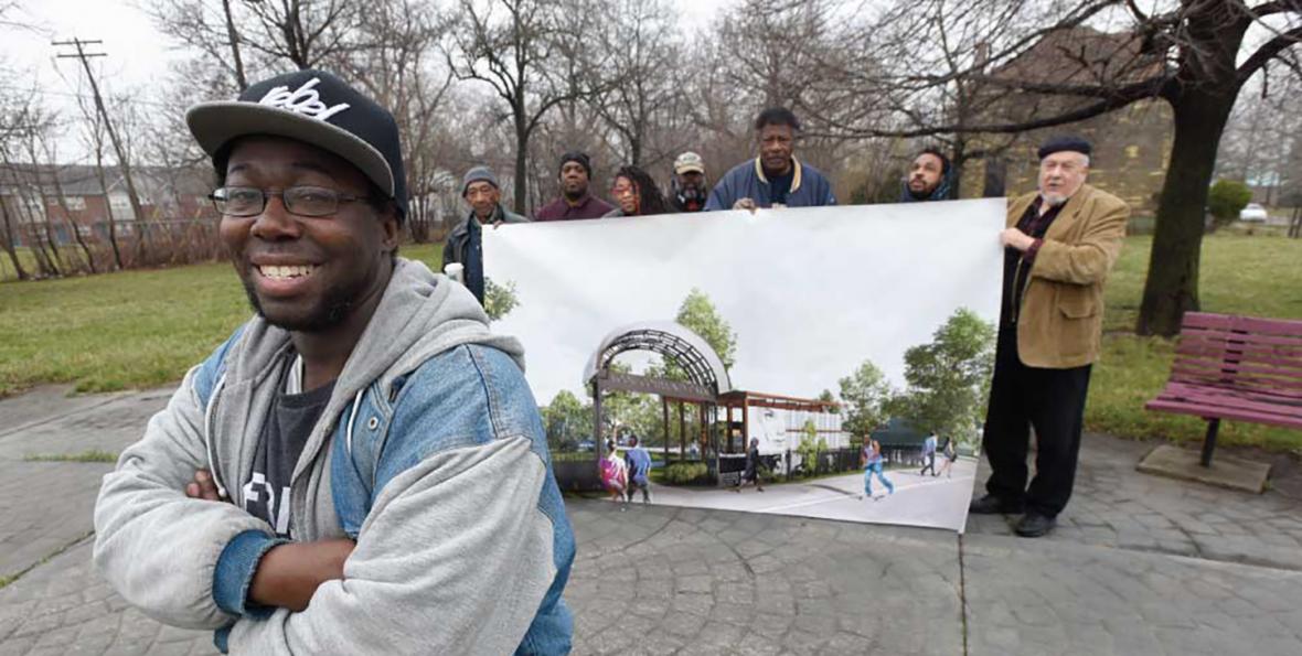 kresge-kipd-oakland-avenue-artists-coalition-2.jpg Jamii Tata, president/CEO of Oakland Avenue Artists Coalition, and supporters show their vision for the proposed Moore Community Park.