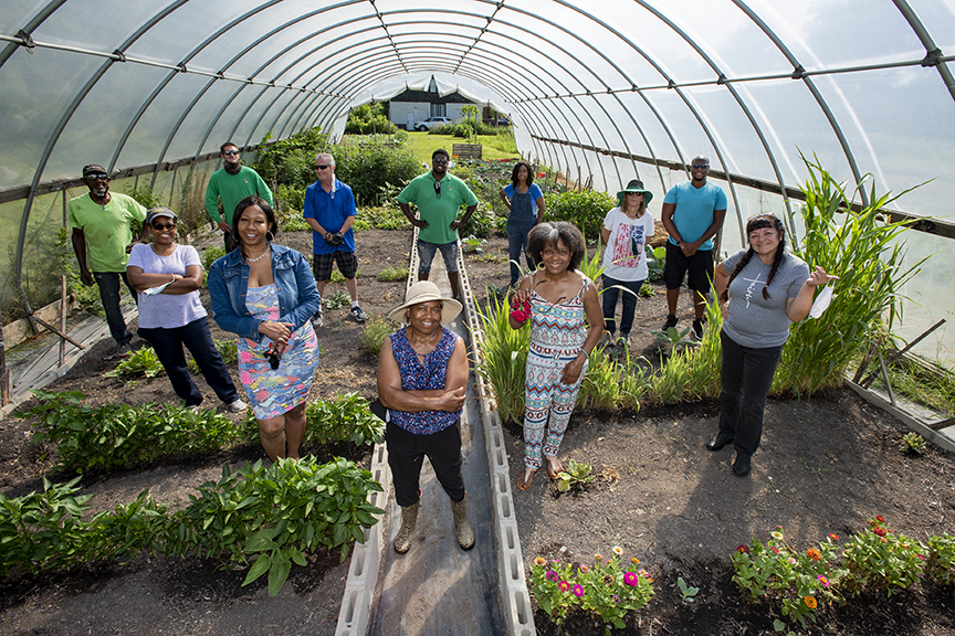 Mt. Olivet Neighborhood Watch Mt. Olivet Neighborhood Watch members in hoop greenhouse