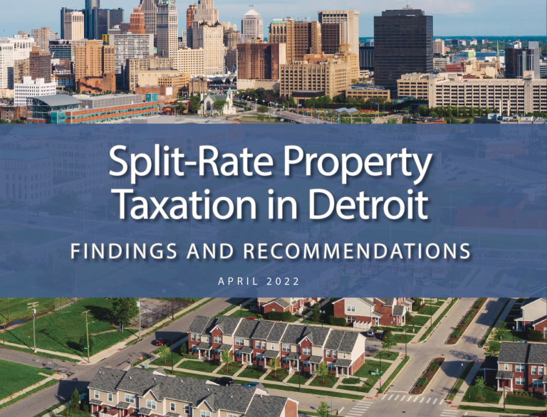 Aerial photo of Detroit downtown taken from some miles away. Superimpopsed text reads "Split-Rate Property Taxation in Detroit: Findings and Recommendations April 2022
