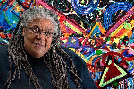 Artist Gilda Snowden with painting in background