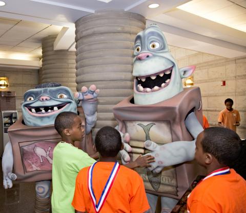 Children greet "Boxtroll" characters at the Charles H. Wright Museum of African American History. 