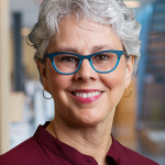 A photo of Cecilia Munoz, wearing glasses