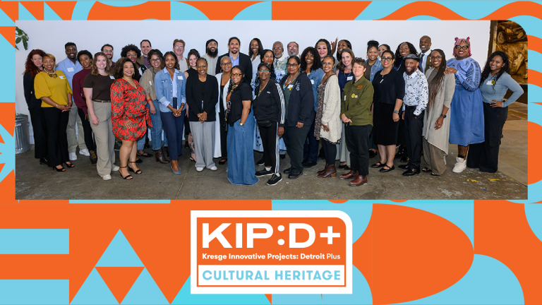 A graphic with a photo of a large group of people that received standing in front of a white wall and text that reads: KIP:D+ Kresge Innovative Projects: Detroit Plus Cultural Heritage.