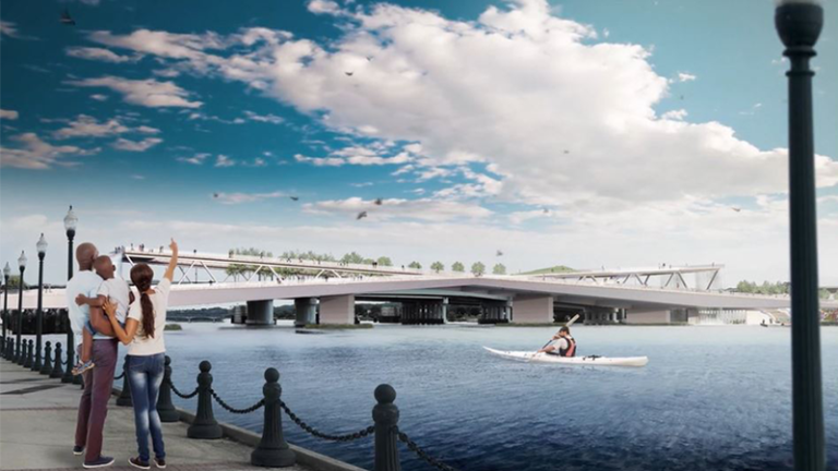 A rendering shows a white, modern pedestrian bridge spanning a blue river. A kayaker floats by and a family stands on the pier enjoying the view.