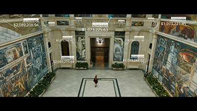 A still from the film Gradually, Then Suddenly of the Rivera Court in the Detroit Institute of Arts with valuations of the art.