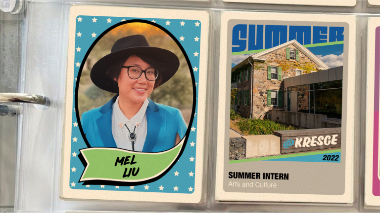A binder with two vintage-style baseball cards in plastic inserts. The first card on the left features a photo of a student intern in a wide brim brown hat and glasses, smiling and their name: Mel Liu. The second card features a photo of a brick farmhouse and a connecting modern building with windows and the text: @Kresge 2022 | Summer Intern | Arts & Culture.